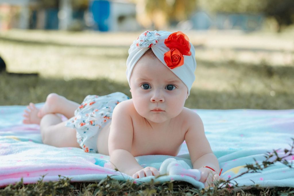 Baby doing tummy time on a blanket